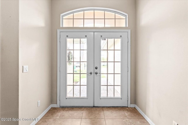 1211 Olde Bailey Ln, Melbourne, FL 32904 - entryway featuring french doors and light tile patterned flooring
