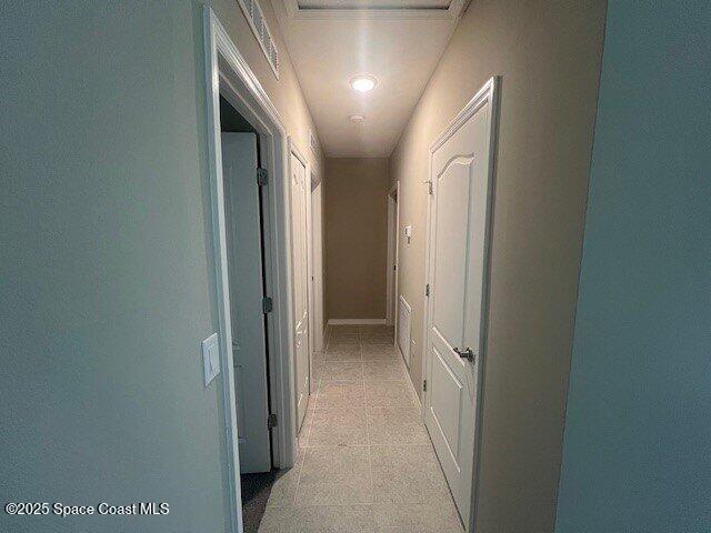 465 Hatcher St SE, Palm Bay, FL 32909 - corridor featuring baseboards