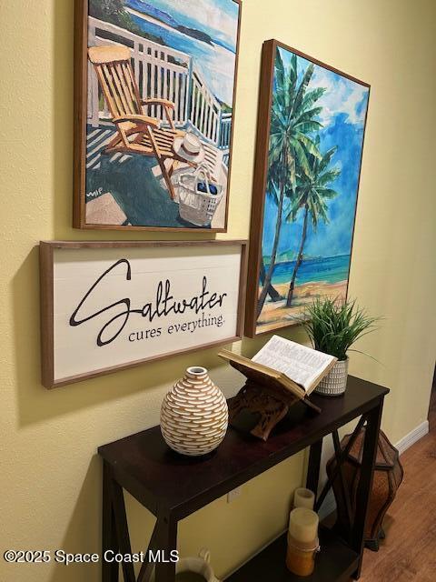 1119 Blossom Dr, Sebastian, FL 32958 - detailed view of wood finished floors and baseboards