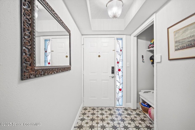 530 S Brevard Ave Unit 315, Cocoa Beach, FL 32931 - foyer entrance with tile patterned floors and baseboards
