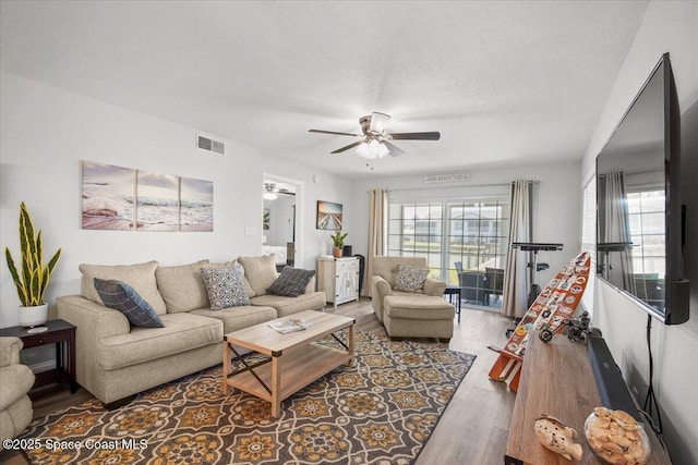 530 S Brevard Ave Unit 315, Cocoa Beach, FL 32931 - living room with ceiling fan and wood finished floors