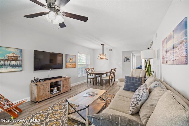 530 S Brevard Ave Unit 315, Cocoa Beach, FL 32931 - living area featuring light wood-style flooring and ceiling fan