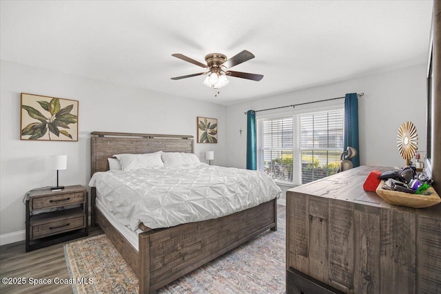 530 S Brevard Ave Unit 315, Cocoa Beach, FL 32931 - bedroom featuring wood finished floors and ceiling fan