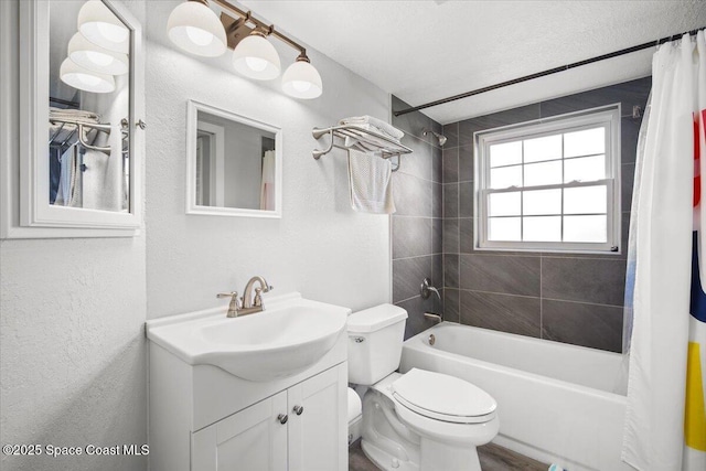 530 S Brevard Ave Unit 315, Cocoa Beach, FL 32931 - bathroom with vanity, shower / tub combo, and a textured wall