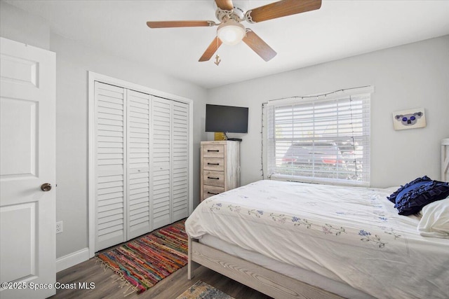 530 S Brevard Ave Unit 315, Cocoa Beach, FL 32931 - bedroom featuring wood finished floors, a closet, and ceiling fan