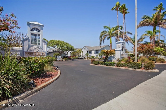 530 S Brevard Ave Unit 315, Cocoa Beach, FL 32931 - view of asphalt road with a residential view and curbs