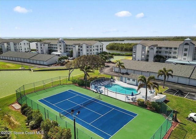 530 S Brevard Ave Unit 315, Cocoa Beach, FL 32931 - view of tennis court with a community pool
