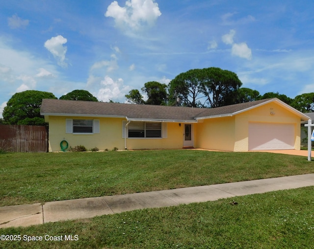 220 Maureen Ave, Merritt Island, FL 32953 - ranch-style home with a garage, concrete driveway, and stucco siding