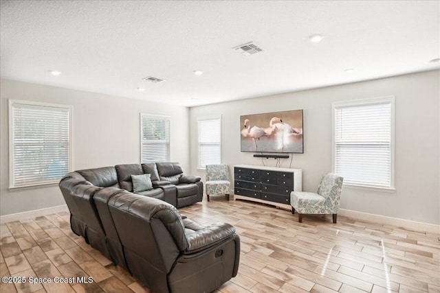 848 Brookview Ln, Rockledge, FL 32955 - living room with light wood finished floors and recessed lighting