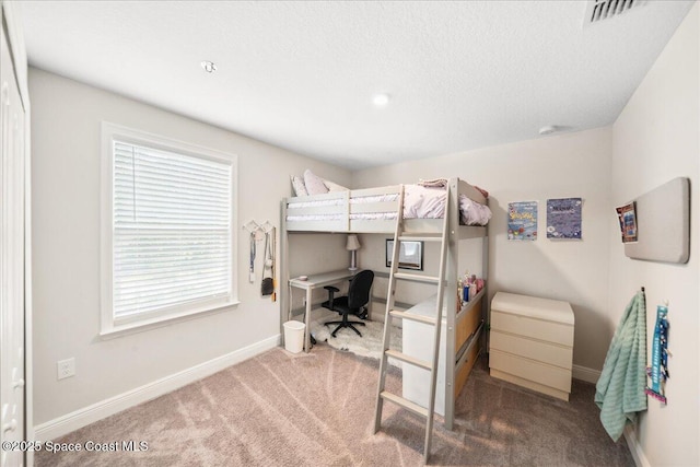 848 Brookview Ln, Rockledge, FL 32955 - carpeted bedroom featuring an office area and a textured ceiling