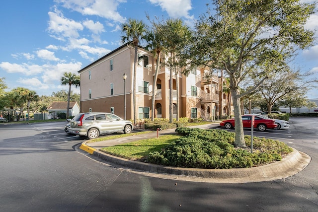 6470 Borasco Dr Unit 3106, Melbourne, FL 32940 - view of property featuring uncovered parking