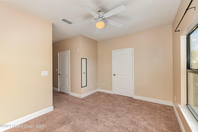 6470 Borasco Dr Unit 3106, Melbourne, FL 32940 - carpeted empty room featuring a ceiling fan and baseboards