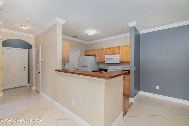 6470 Borasco Dr Unit 3106, Melbourne, FL 32940 - kitchen featuring white appliances, ornamental molding, arched walkways, light tile patterned floors, and baseboards