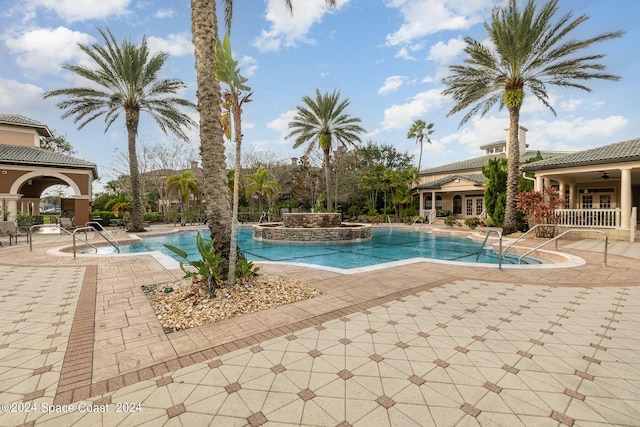 6470 Borasco Dr Unit 3106, Melbourne, FL 32940 - community pool with a patio, a jacuzzi, and a ceiling fan