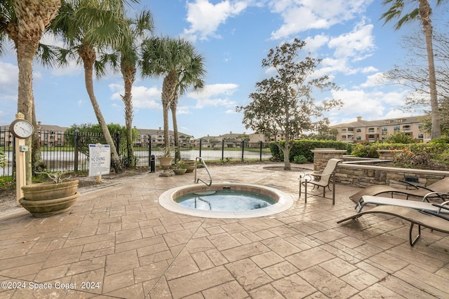 6470 Borasco Dr Unit 3106, Melbourne, FL 32940 - view of pool featuring a hot tub and a patio
