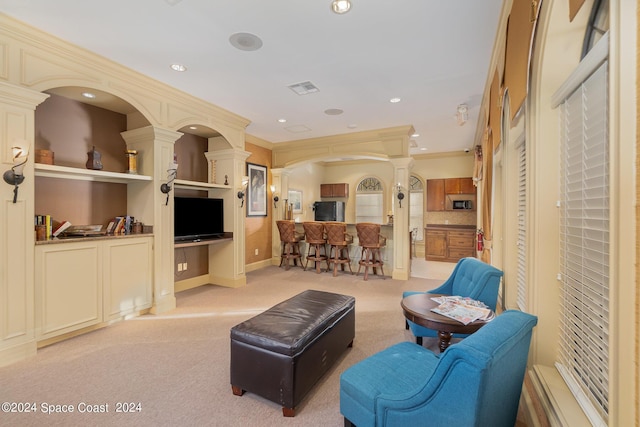 6470 Borasco Dr Unit 3106, Melbourne, FL 32940 - living room with decorative columns, light carpet, recessed lighting, and ornamental molding