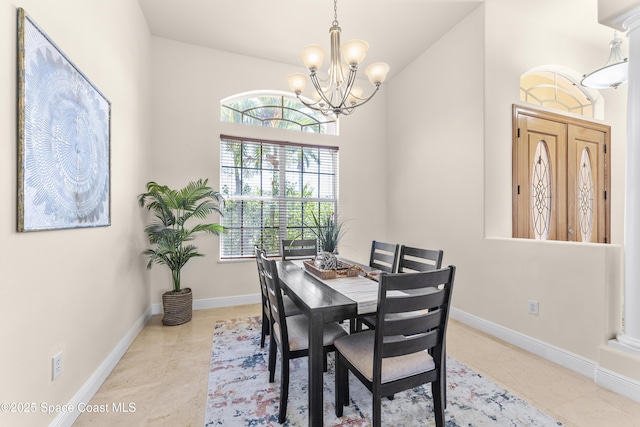 3631 Thurloe Dr, Rockledge, FL 32955 - dining room featuring a chandelier, healthy amount of natural light, and baseboards
