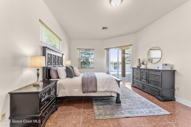 3631 Thurloe Dr, Rockledge, FL 32955 - tiled bedroom with access to outside and baseboards