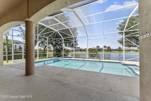 3631 Thurloe Dr, Rockledge, FL 32955 - swimming pool featuring a lanai, a patio area, and a water view
