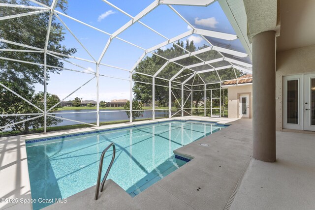 3631 Thurloe Dr, Rockledge, FL 32955 - outdoor pool with a patio area, a lanai, french doors, and a water view