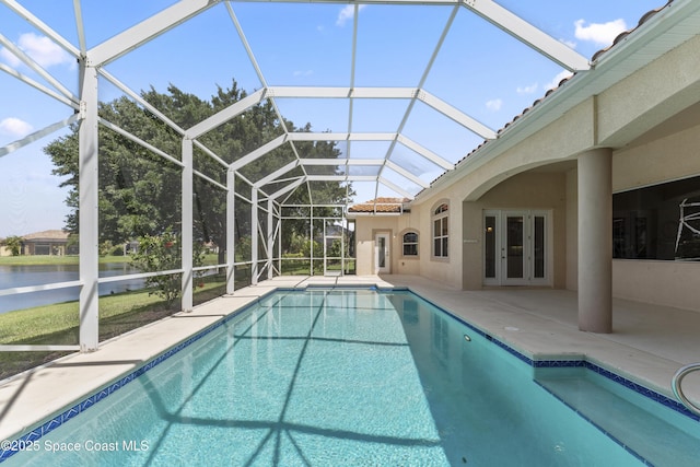 3631 Thurloe Dr, Rockledge, FL 32955 - outdoor pool featuring french doors, a patio area, a water view, and a lanai