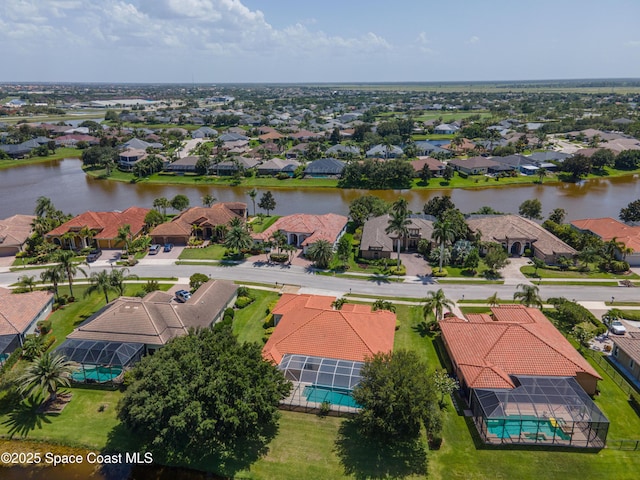 3631 Thurloe Dr, Rockledge, FL 32955 - aerial perspective of suburban area featuring a pool and a nearby body of water