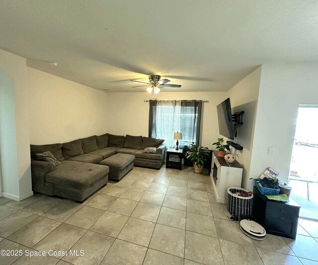 171 Knight St SE, Palm Bay, FL 32909 - living room with light tile patterned floors and a ceiling fan