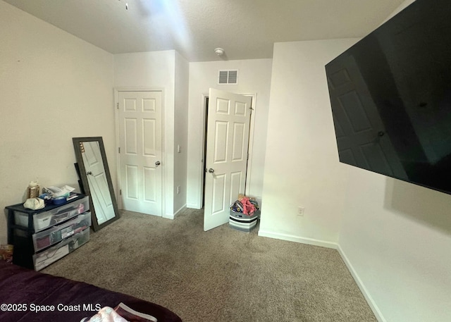 171 Knight St SE, Palm Bay, FL 32909 - unfurnished bedroom featuring carpet floors and baseboards