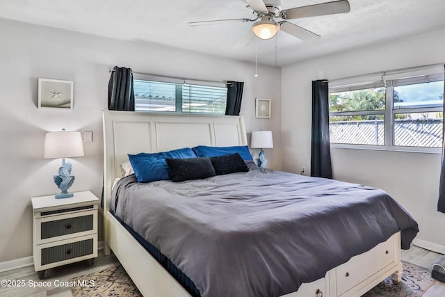 348 Berkeley St, Satellite Beach, FL 32937 - bedroom featuring wood finished floors and ceiling fan