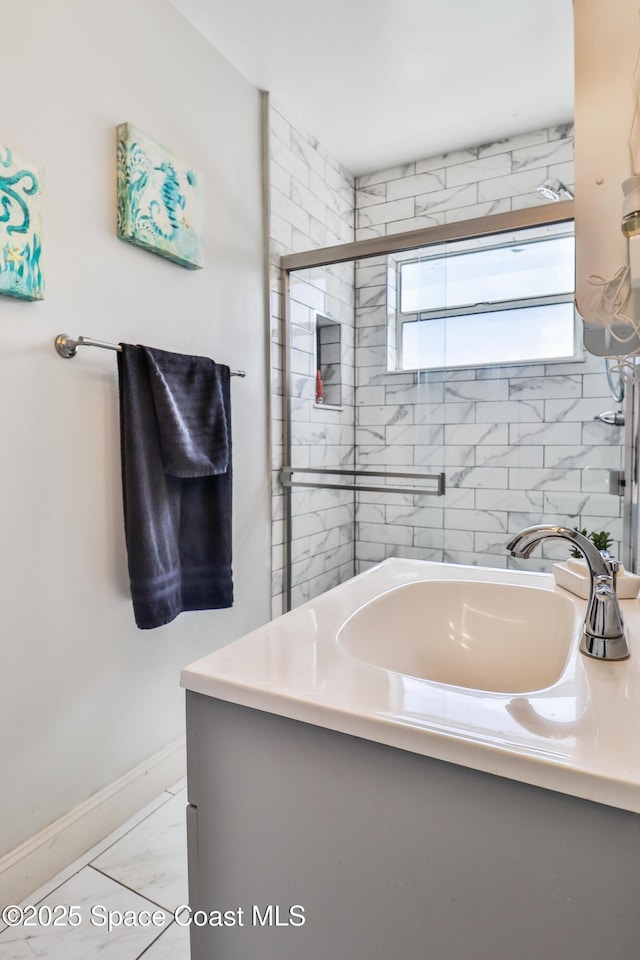348 Berkeley St, Satellite Beach, FL 32937 - bathroom with marble look tiles and tiled shower
