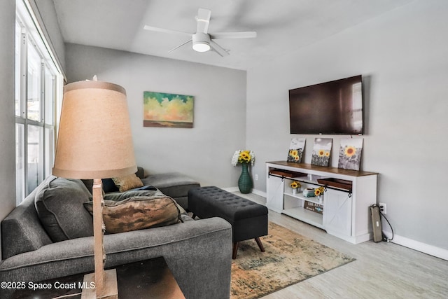 348 Berkeley St, Satellite Beach, FL 32937 - living area with wood finished floors and ceiling fan