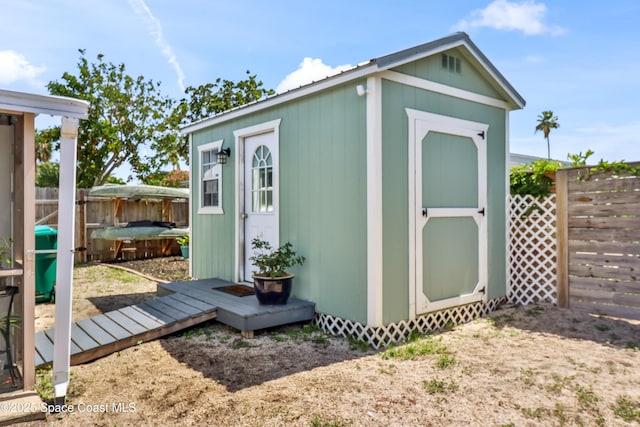 348 Berkeley St, Satellite Beach, FL 32937 - view of shed featuring a fenced backyard