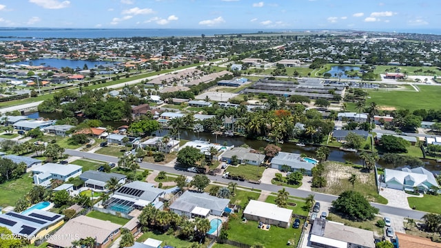 348 Berkeley St, Satellite Beach, FL 32937 - aerial overview of property's location featuring nearby suburban area and a large body of water