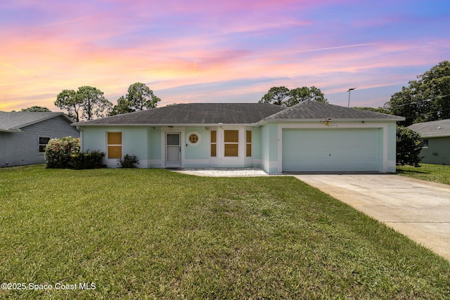 6856 Buxton Ave, Cocoa, FL 32927 - single story home featuring an attached garage, driveway, stucco siding, and a front lawn