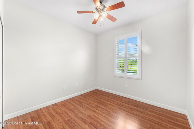 3654 Gurrero Dr, Melbourne, FL 32940 - empty room featuring light wood finished floors and a ceiling fan