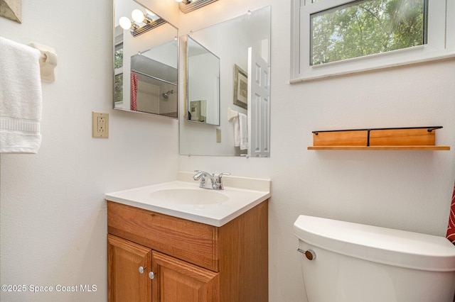 1265 Helias St NW, Palm Bay, FL 32907 - bathroom with toilet and vanity