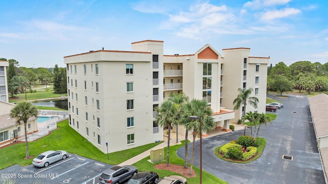 1420 Huntington Ln Unit 2405, Rockledge, FL 32955 - view of apartment building / complex with uncovered parking