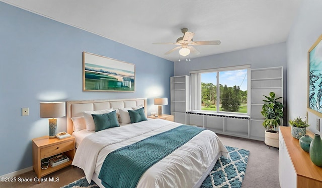 1420 Huntington Ln Unit 2405, Rockledge, FL 32955 - carpeted bedroom with ceiling fan and baseboards
