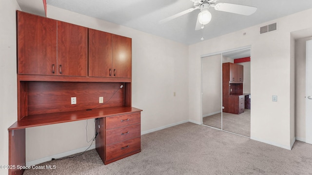 1420 Huntington Ln Unit 2405, Rockledge, FL 32955 - unfurnished office with light carpet and a ceiling fan