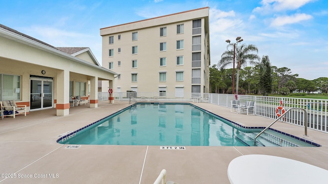 1420 Huntington Ln Unit 2405, Rockledge, FL 32955 - community pool with a patio