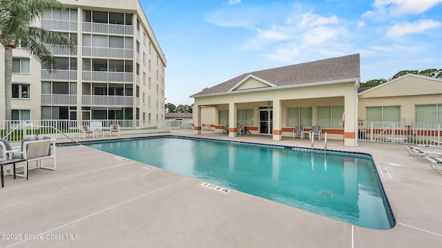 1420 Huntington Ln Unit 2405, Rockledge, FL 32955 - community pool featuring a patio