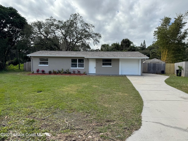 711 Sara Jane Ln, Merritt Island, FL 32952 - single story home with an attached garage, driveway, and stucco siding