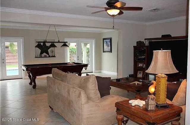 22100 Serenata Cir W, Boca Raton, FL 33428 - living area with pool table, french doors, ornamental molding, and a ceiling fan