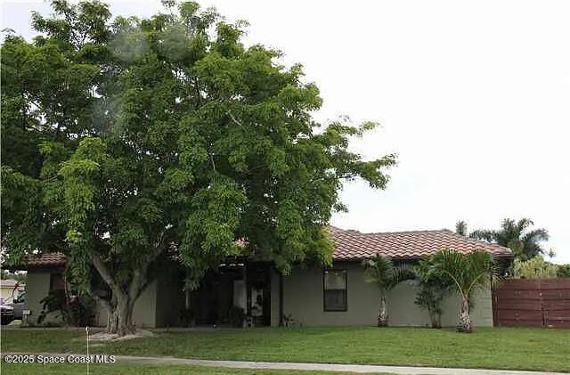 22100 Serenata Cir W, Boca Raton, FL 33428 - rear view of house featuring a tiled roof and stucco siding