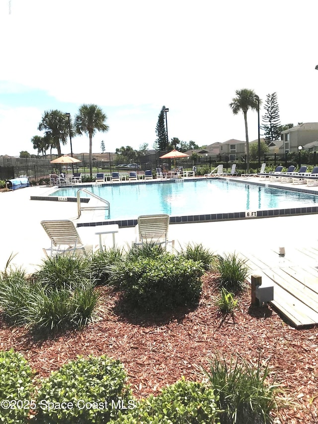 1470 Sheafe Ave NE Unit 108, Palm Bay, FL 32905 - community pool featuring a patio