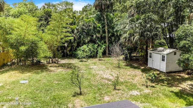 321 Sagamore St, Melbourne, FL 32904 - view of grassy yard with a shed