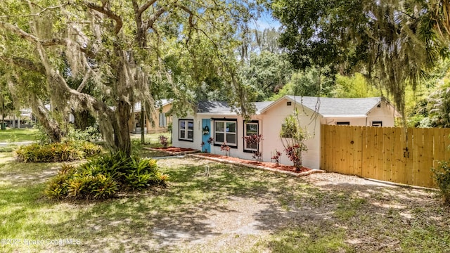 321 Sagamore St, Melbourne, FL 32904 - rear view of property with stucco siding