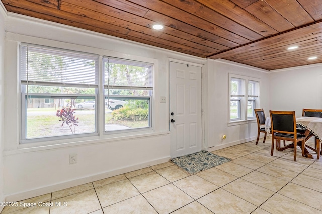 321 Sagamore St, Melbourne, FL 32904 - foyer entrance featuring wood ceiling, light tile patterned flooring, and recessed lighting