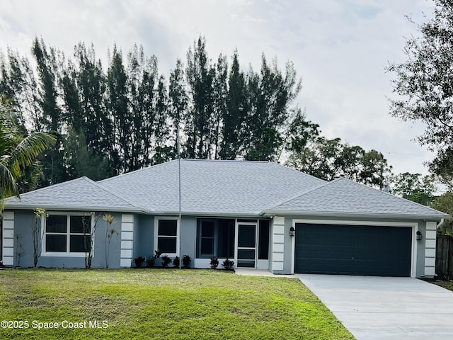 476 Garbelmann St SW, Palm Bay, FL 32908 - ranch-style house with an attached garage, driveway, roof with shingles, a front lawn, and stucco siding