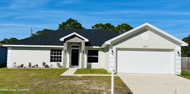 1271 Rabbit St SE, Palm Bay, FL 32909 - ranch-style house featuring a front lawn, driveway, an attached garage, stucco siding, and a shingled roof